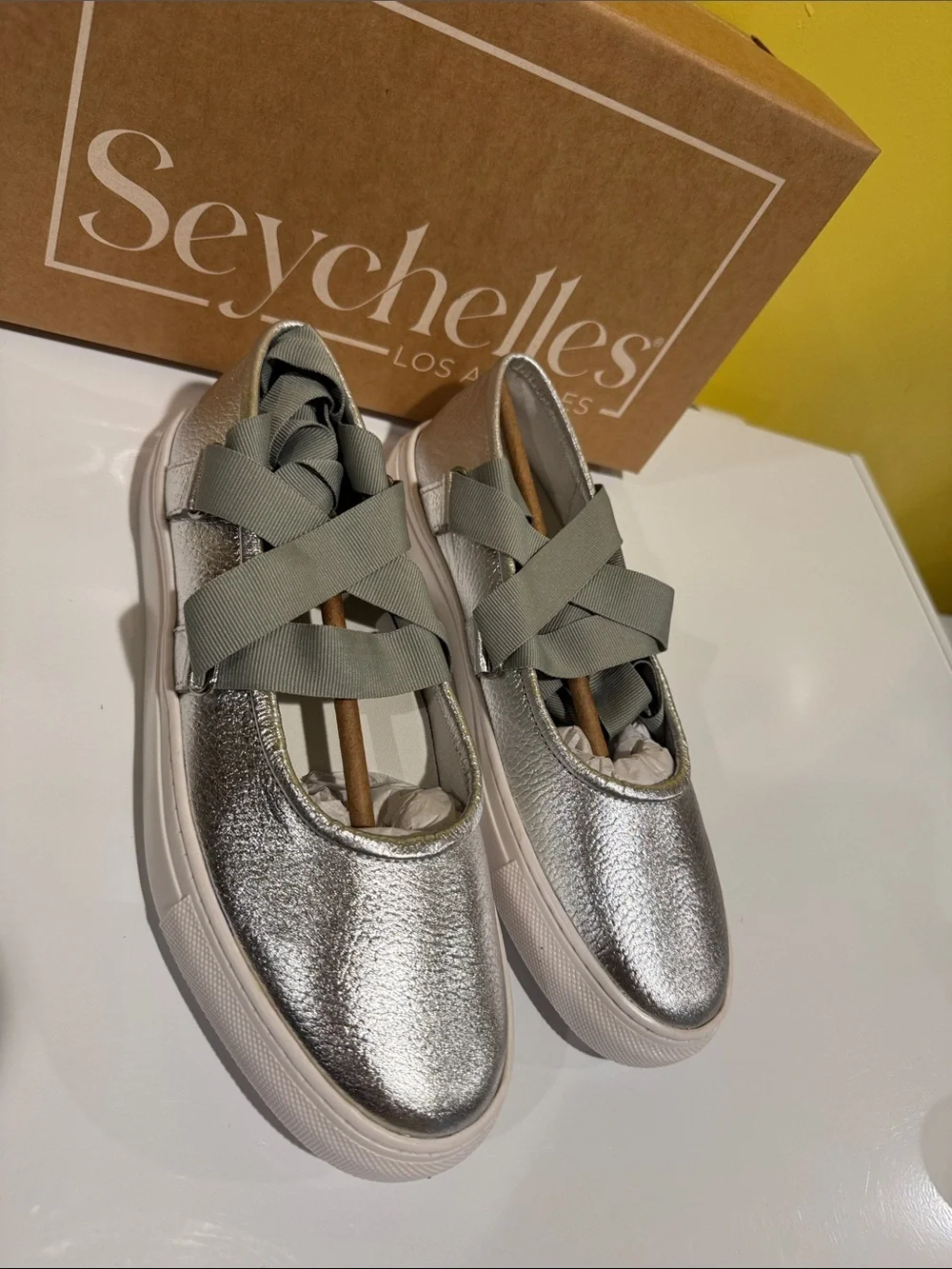 NIB Seychelles ribbons silver flats slip on .